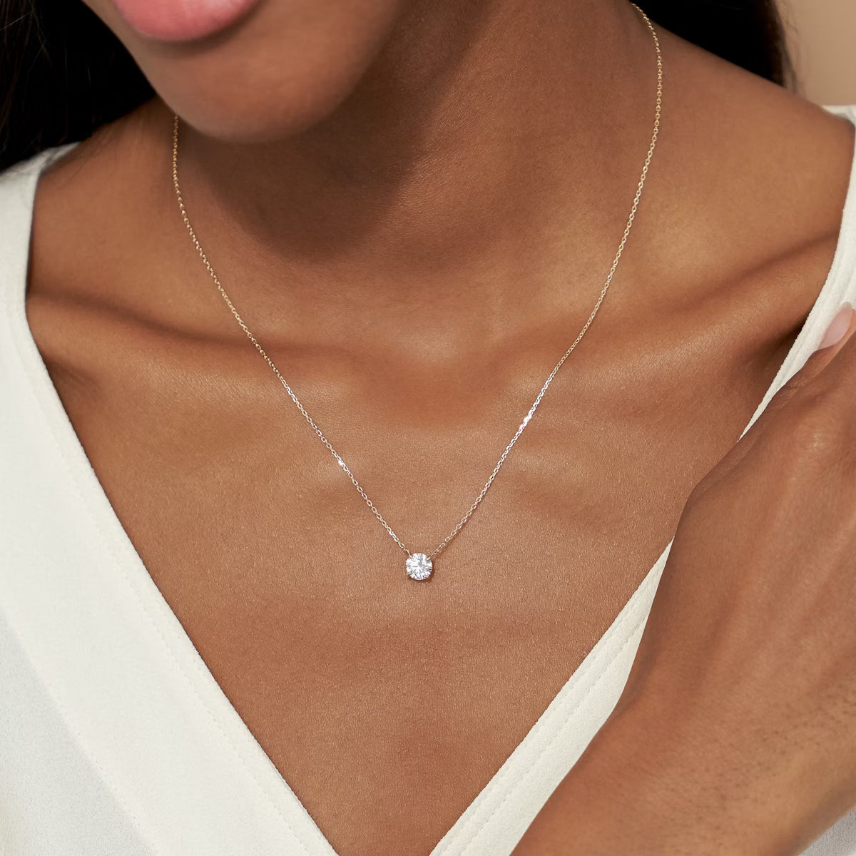Ethically sourced diamond solitaire necklace with prong setting and cable chain